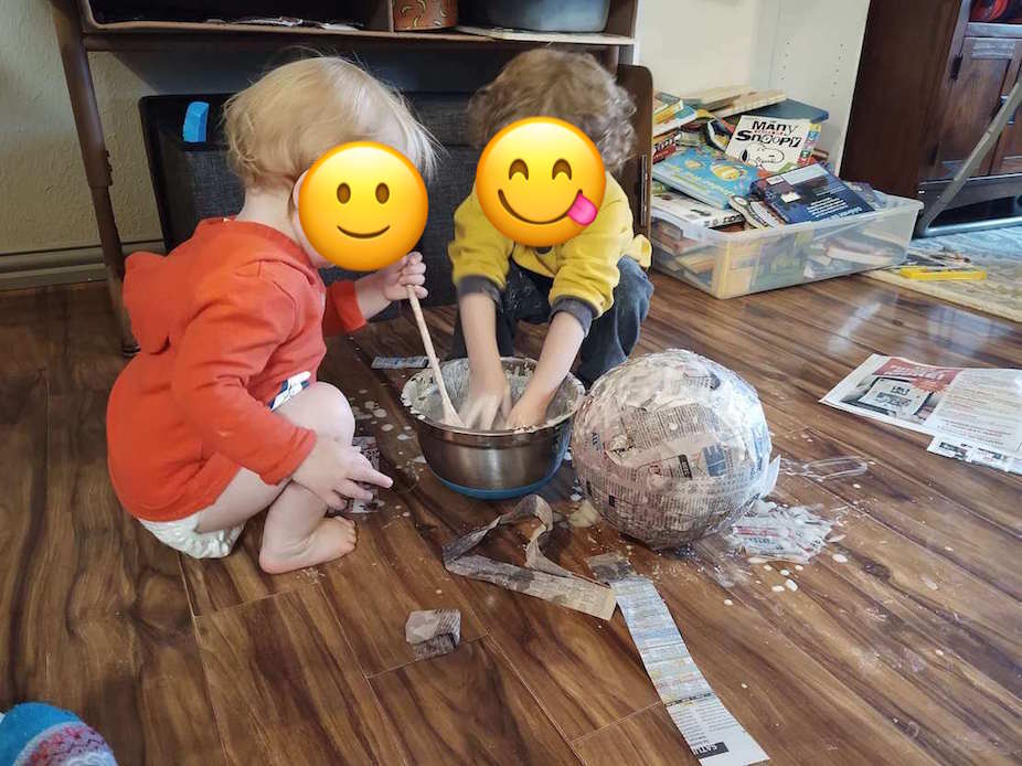 kids crafting with paper mache
